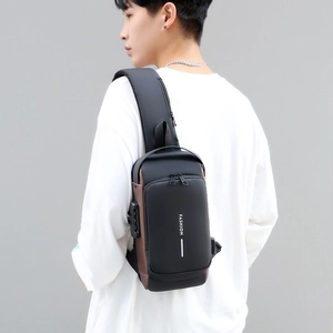 Men's black outdoor sling chest bag with USB charging port and vertical fashion print