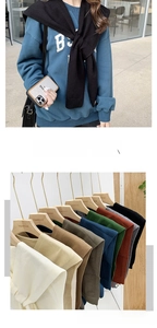 Detailed grid showing diverse color options of knitted solid color shoulder shawls