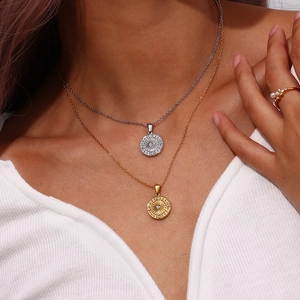 Fashionable stainless steel compass pendant necklace with zircon for a layered jewelry look