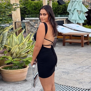 Sexy backless black mini dress with cross bandage design and slim fit silhouette