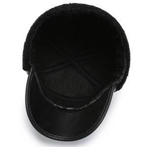 Detail view of winter baseball cap with warm faux fur lining and black leather exterior