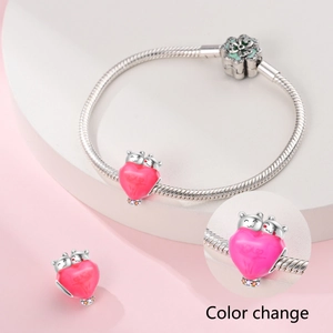 Silver color-changing heart charm bead on snake chain bracelet with pink crystals