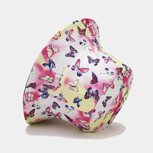 Reversible bucket hat with yellow pink tie-dye butterfly print for outdoor sun protection
