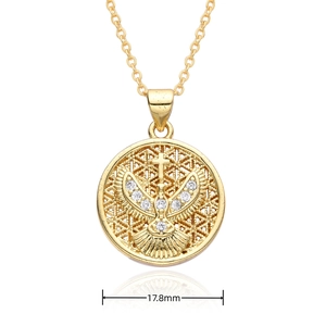 Detail showing an 18k gold 17.8mm swallow eagle totem pendant with white crystal accents