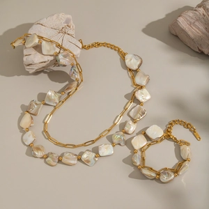 Minimalist double-layer stainless steel necklace and bracelet set with natural shells