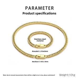 Macro view of gold stainless steel curb chain set showing detailed links and texture
