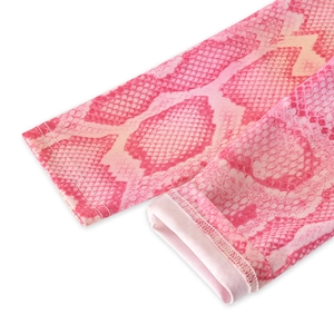 Detailed close-up of pink snakeskin pattern fabric with premium stitching and texture
