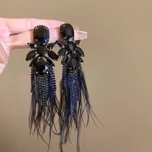 Dark gothic black flower feather earrings with long tassel fringe and gemstone accents