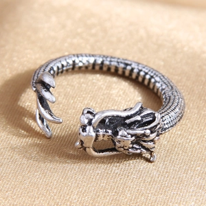 Vintage silver dragon wing open ring featuring intricate 3D embossed scales and textures