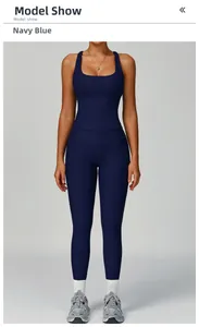 Detail of ribbed navy blue yoga set featuring a square neck tank top and high waist leggings