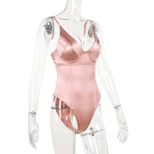 Detail of pink satin bodysuit with supportive cups and delicate spaghetti straps