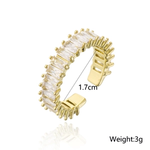 Close-up of 18K gold plated ring with rectangular zircons, 1.7cm diameter and 3g weight