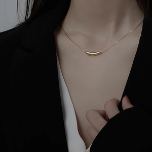 Minimalist 18K gold plated stainless steel necklace with geometric curved tube pendant