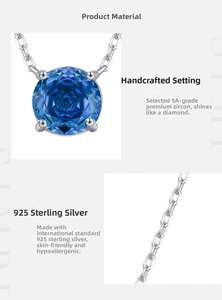 Macro detail of 925 sterling silver chain and 5A sapphire blue zircon pendant