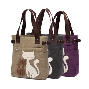 Canvas cat tote bags in beige, grey, and purple colors with studded cat appliqué