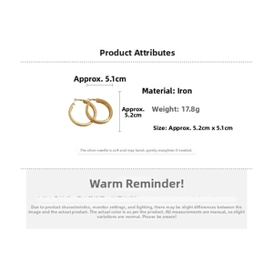 Detail view of gold-plated hoop earrings with size 5.2cm diameter and 17.8g weight
