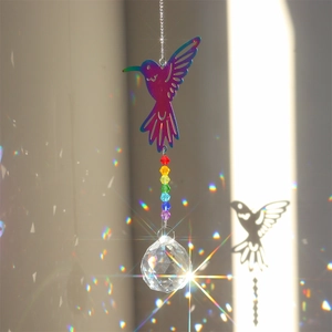 Hummingbird crystal suncatcher with iridescent metal plating and faceted crystal ball
