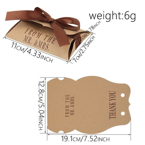 Vintage kraft paper pillow gift box with brown ribbon and Thank You typography