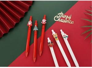 Close-up of Christmas gel pens with 3D Santa, Reindeer and Snowman rubber toppers