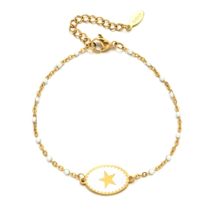 Detail view of gold stainless steel bracelet with white beads and star enamel charm