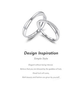 Detail of S925 sterling silver Mobius rings showing crossed band design and zircon inlay