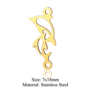 Detailed macro view of 7x18mm golden stainless steel dolphin charm for DIY jewelry