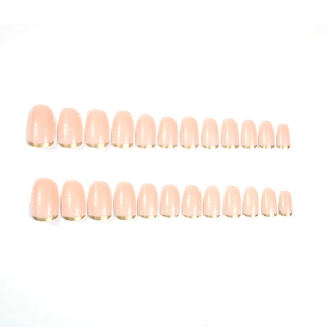 Short oval press-on nails with nude base and golden French tips, 24 pieces set