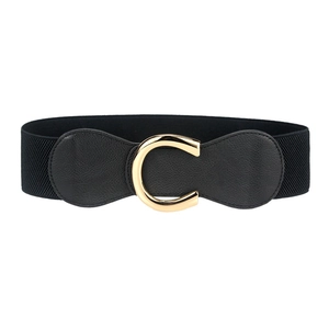 Elastic black waist belt for women with a large gold C-shaped metal buckle on a white background