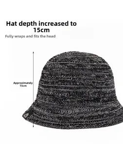 Detail view of the 15cm deep crown on a black breathable knitted bucket sun hat