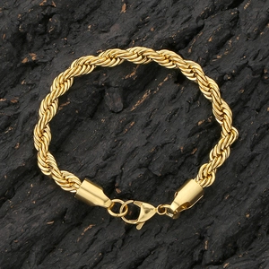 Detailed view of a gold-plated stainless steel rope chain bracelet with a lobster clasp