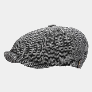 Classic herringbone newsboy hat with leather trim and vintage metal button details
