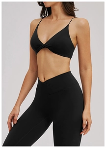 Soutien-gorge de sport col V noué et leggings de yoga taille croisée en noir