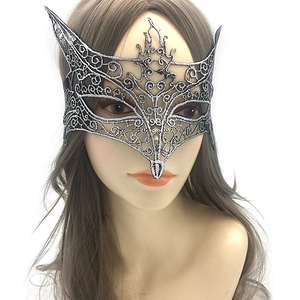 Detailed close-up of a silver lace hollow-out cat eye mask for masquerade parties