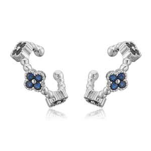 Close-up of clover ear cuffs with blue and black crystals in polished silver finish
