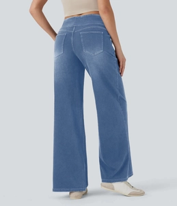 Detailansicht der High Waist Wide Leg Jeans mit weißen Kontrastnähten und Gesäßtaschen