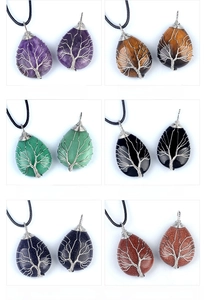Variety of wire-wrapped water drop pendants featuring tree of life and natural stones