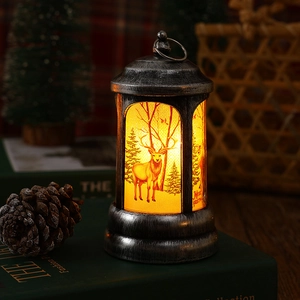 Vintage Christmas LED lantern with warm light reindeer scene and silver metallic finish