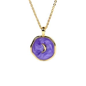 Detailed macro view of gold-plated crescent moon heart pendant with purple enamel glaze