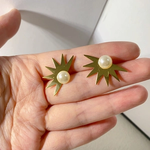 Elegant 18k gold plated titanium steel starburst earrings with white pearls for women