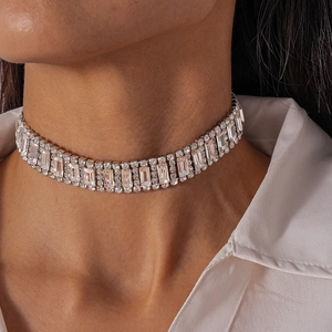 Detail of silver choker necklace with rectangular crystal rhinestones on a model