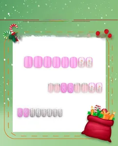 Detail of Christmas press-on nails featuring 3D sweater texture and festive silver glitter
