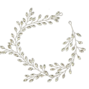 Silver marquise crystal bridal headband with delicate leaf design on white background