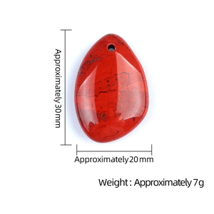 Natural teardrop red jasper stone pendant with dimensions of 20x30mm on white background