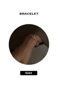Detail view of the 18k gold plated watchband style ring with heavy metal links