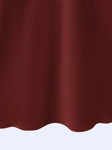 Detailed close-up of burgundy dress fabric showing soft wavy edges and smooth texture