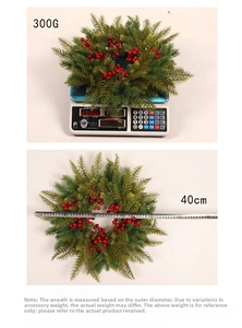 Detailed view of a 40cm Christmas wreath weighing 300g with red berries and pine needles