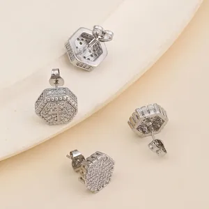 Sparkling hexagonal zircon stud earrings with cross design in silver finish for men and women