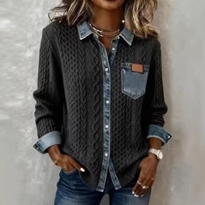 Close-up of cable knit stitching and denim patchwork on a long sleeve shirt jacket