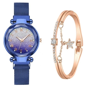 Close-up of blue quartz watch with gradient dial and matching star pendant bracelet