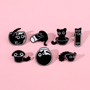 Collection of seven black cat enamel pins showing cats in various containers